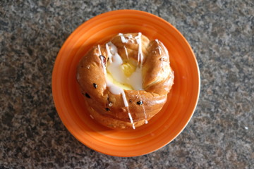 Custard Copenhagen on an orange plate