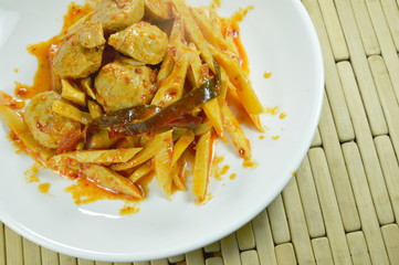 spicy stir fried bamboo shoot with pork ball curry on plate