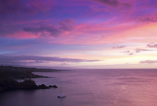A Catamaran in Honolua Bay at Sunset, Maui, Hawaii
