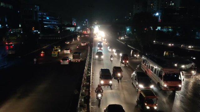 A night time lapse video of the Indian metro city traffic