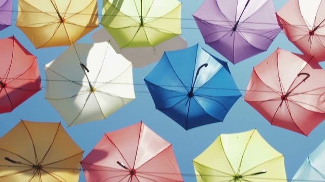 Colored umbrellas against the sky.