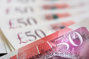 fifty pound notes in UK sterling currency
