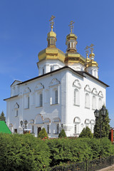 Fototapeta na wymiar Trinity Cathedral among flowers in Tyumen