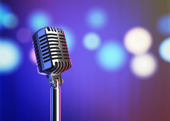Retro microphone on stage with blurred lights. 3D illustration