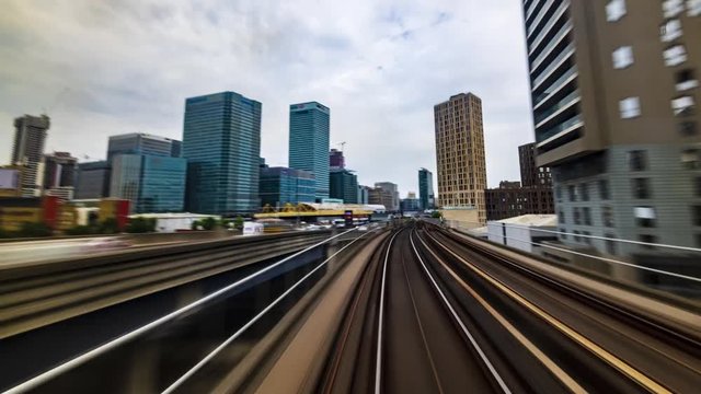 Timelapse of the Docklands in London in motion from a fast moving train, POV hyperlapse