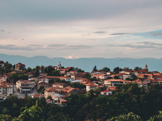 Fototapeta premium aerial view of beautiful city on top of hill in georgia