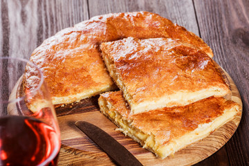 Ajarian Khachapuri traditional Georgian cheese pastry on cutting board. Homemade baking. Top view