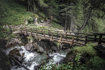 wooden bridge and saent waterfall