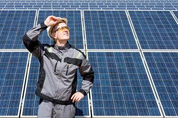 Solar panels engineer in white cask