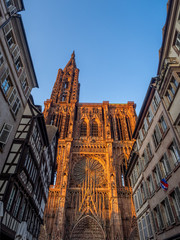 Cathedrale Notre-Dame or Cathedral of Our Lady of Strasbourg behind famous typical half-timbered houses, Alsace, France