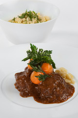 Braised beef with carrots.