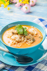 Tomato soup with rice.
