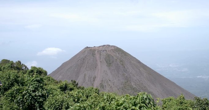 Top of a dead volcano in a sunny day and cloudy sky