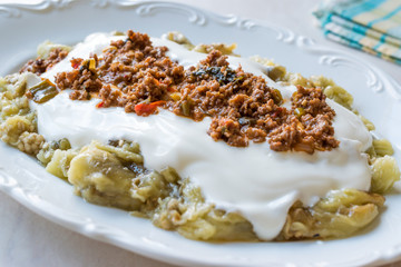 Turkish Ali Nazik Kebab with Yogurt, Minced Meat and Roasted Eggplant or Aubergine / Kebap.