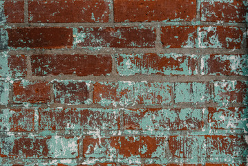 Red Brick Wall with turquoise paint