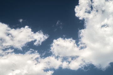 white clouds on blue sky at summer with sunshine