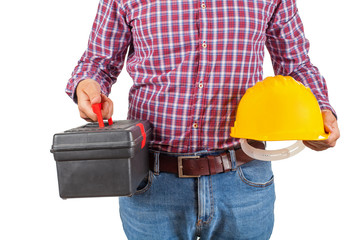 Close up yellow hard hat and tool kit