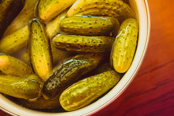 Cucumbers soaked in water for pickling. Homemade cucumbers. . Stocks for the winter. Billets from vegetables.