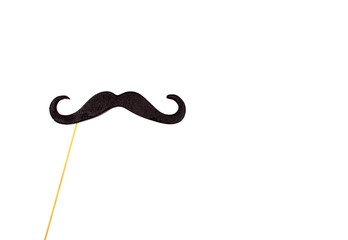 Moustache on a stick (isolated on white, copy space on the right), minimal concept