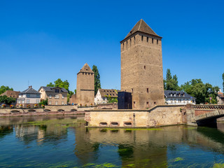 Fototapeta na wymiar The Towers of Ponts Couverts in Strasbourg. Strasbourg is the capital and largest city of the Grand Est region of France and is the official seat of the European Parliament.