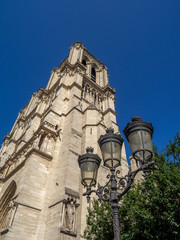 Fototapeta na wymiar Looking up the exterior facade of Notre Dame de Paris cathedral in Paris France. 