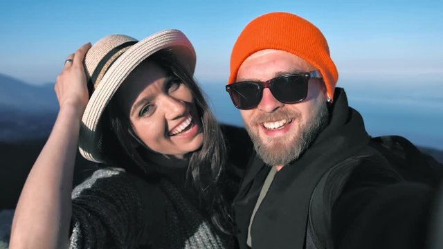 Pov shot happy smiling European couple enjoying outdoor activities taking selfie