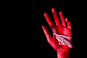 Bloody theme lone murderer: the murderer shows bloody hands and experiencing depression and pain