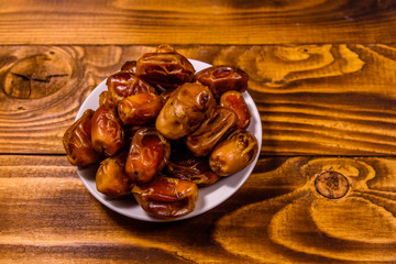 Date fruits on the rustic wooden table