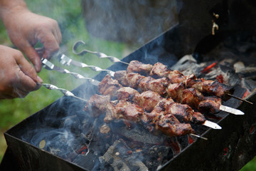 meat is fried on charcoal