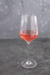Wine glass Rose wine Gourmet Alcohol Wine tasting concept Sommelier Dark concrete background Copy space