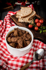 Beef meat stew in ceramic pot.