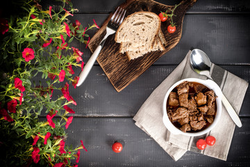 Beef meat stew in ceramic pot.