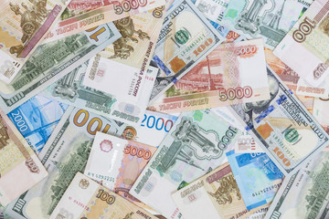 Fototapeta na wymiar Dollars and Russian rubles banknotes. Business concept International currencies background.