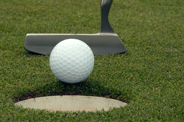 Putting ball in the hole