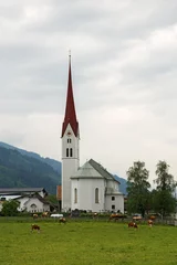 Fototapeten Church in small Tyrolien town Weer, Austria © Pavel Kirichenko