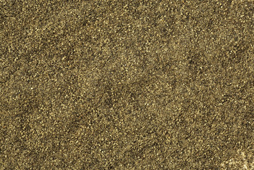 Ground black pepper, as background.