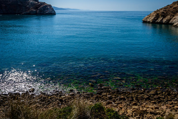 Jebha island and waves and rocks