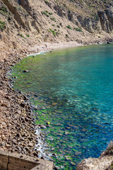 Jebha island and waves and rocks