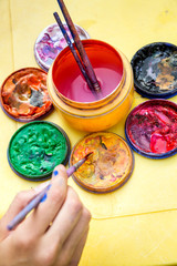 Artist with artistic brush in hand