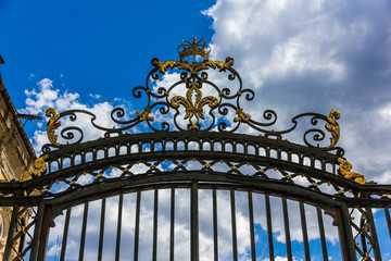 Detail of a gilded gate at the Royal Palace of La Granja de San Ildefonso (Spain)