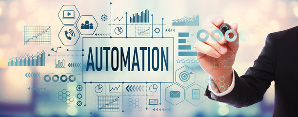 Automation with businessman on blurred abstract background