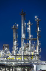 Refinery Distillation Towers At Night