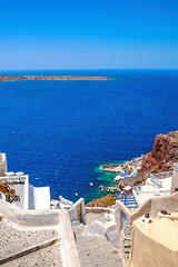 Obraz premium Architecture of the island of Santorini, Thira, Greece. Descent to the sea