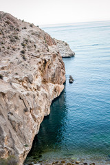 Jebha island and waves and rocks