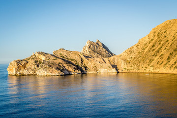 Fototapeta na wymiar Jebha island and waves and rocks
