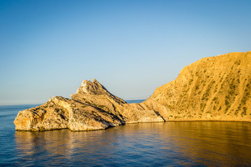 Jebha island and waves and rocks