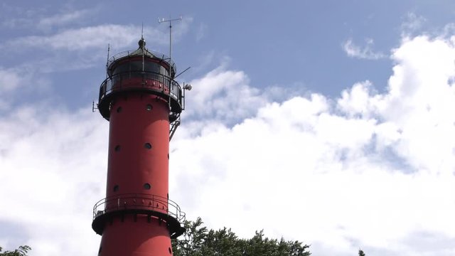 Observation tower. Lighthouse. Blue sky. Antenna,  Panning,Closeup, 