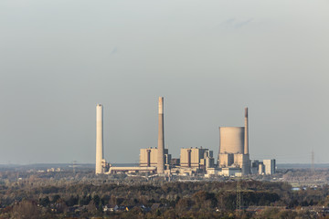 Distant Power Station At Sunset
