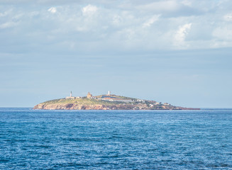 Saaidia island and waves and rocks