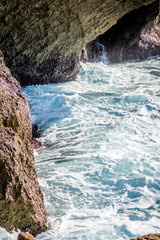 Saaidia island and waves and rocks